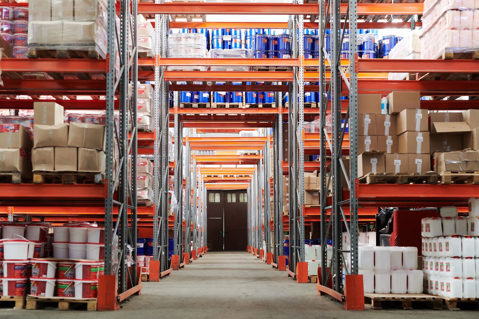 Organized warehouse aisle with palletized cargo